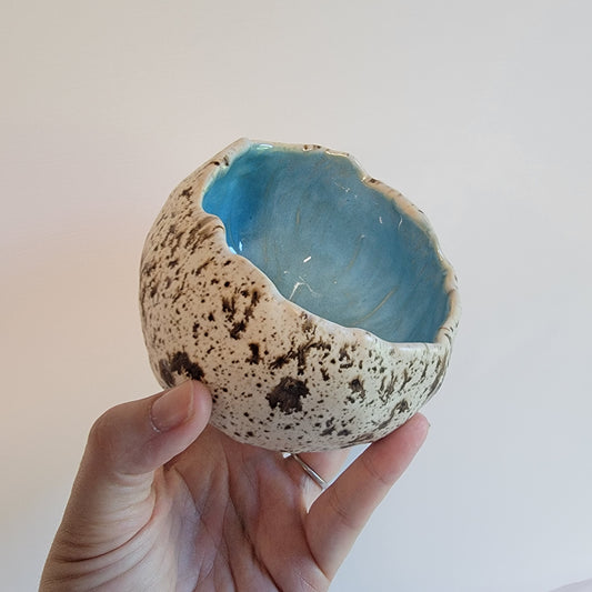 Handbuilt cracked egg shaped bowl